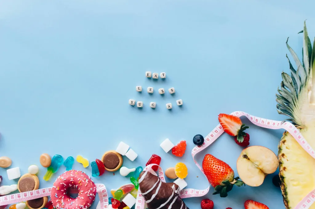 Cuantas calorias necesita una persona al dia - Dulces sobre la mesa