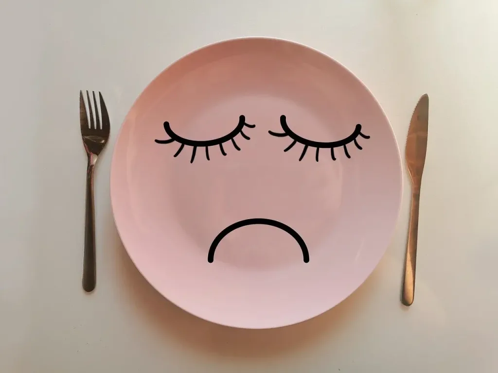 Plato con cara triste